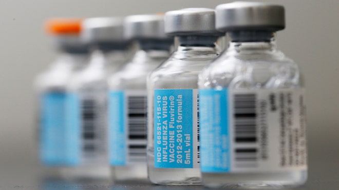 Flu vaccine vials formatted.jpg